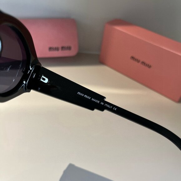 Miu Miu Black Sunglasses with Gold Detail